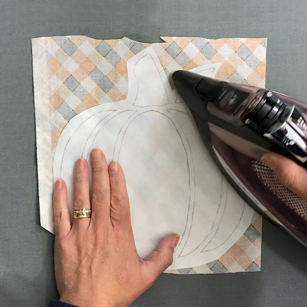 Attaching Heat n' Bond and cutting it out with fabric