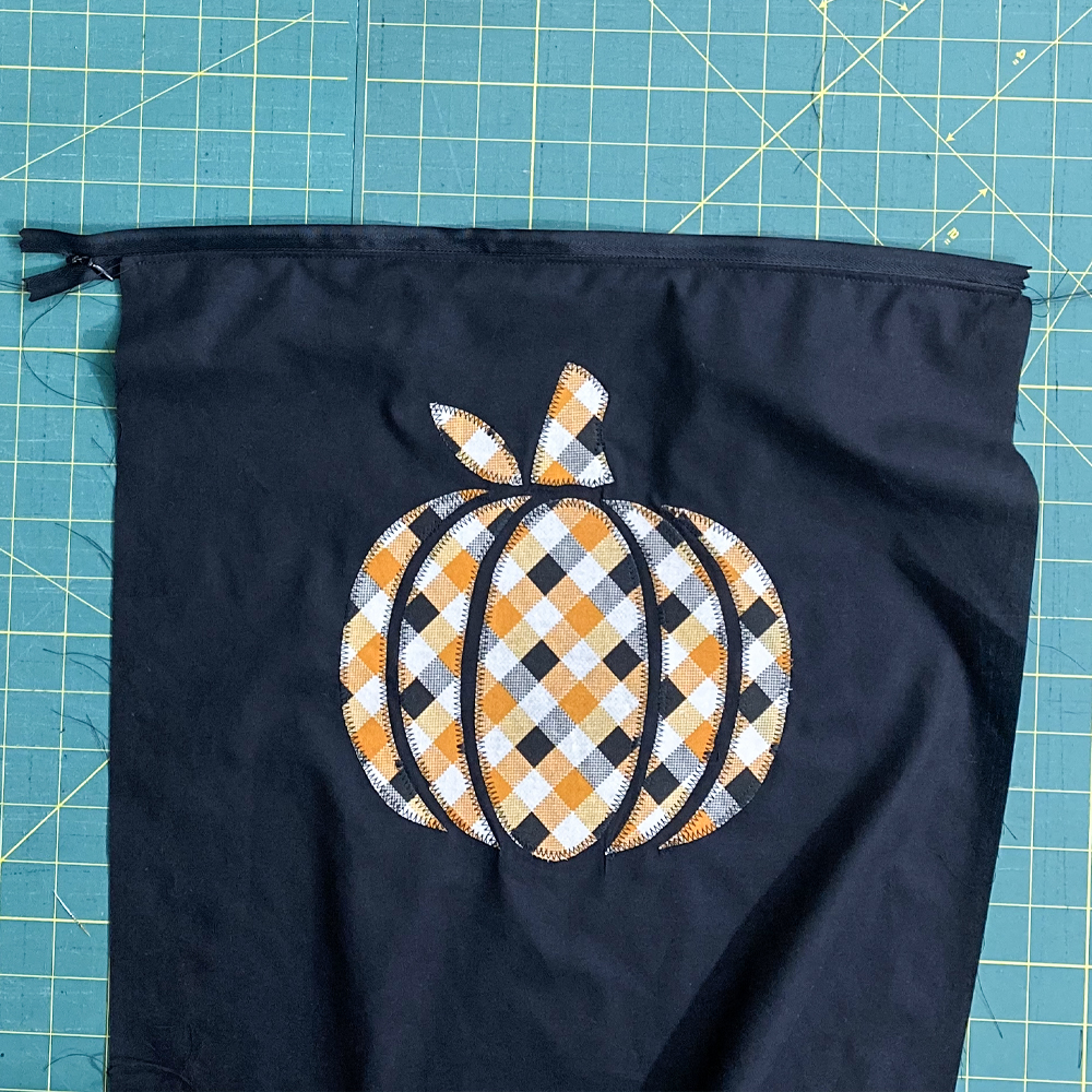 Topstitch zipper into place